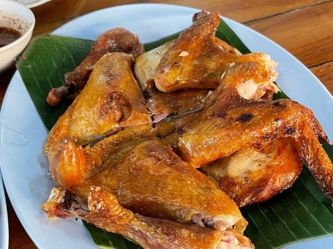 Half Grilled Chicken as pictured in Laap Thai's printed menu